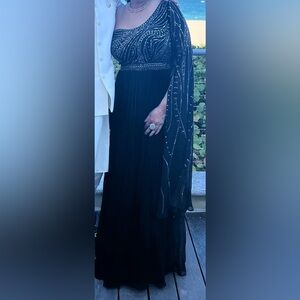 Indian party dress. Black chiffon material, with beaded type adornments.